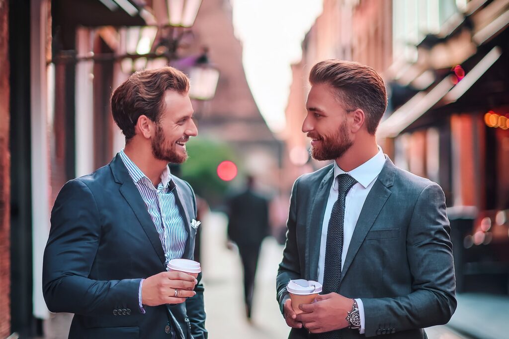 Young men chatting in an English street